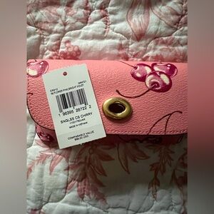 Coach Cherry print glasses case